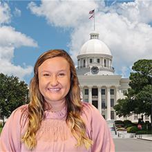 Photo of Cyndi Wynfield with Alabama state capitol in background